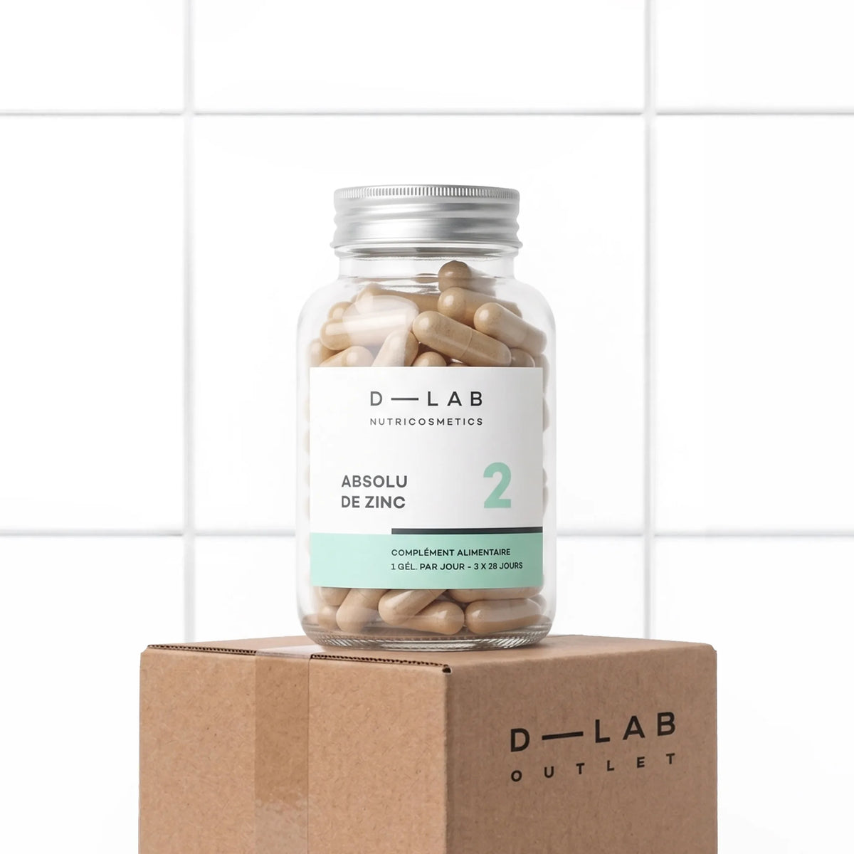 Trois flacons Absolu de Zinc D-LAB, cure 3 mois de zinc, sélénium et vitamines B, packshot sur carton D-LAB Outlet