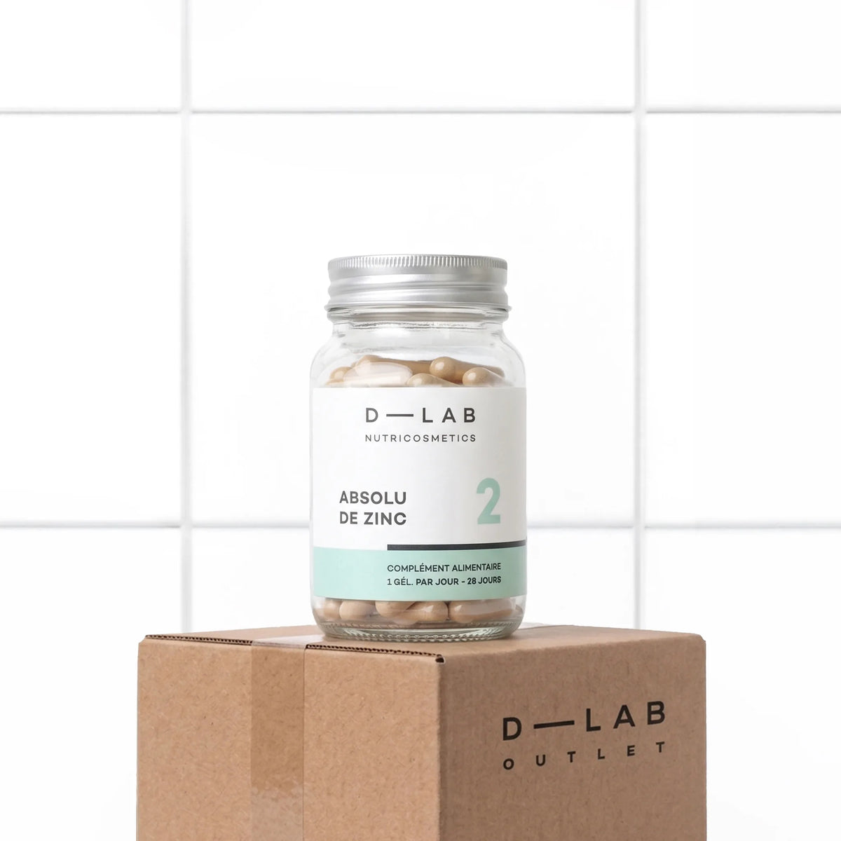 Flacon en verre Absolu de Zinc D-LAB Nutricosmetics, cure 1 mois à 3 formes de zinc, packshot sur carton D-LAB Outlet