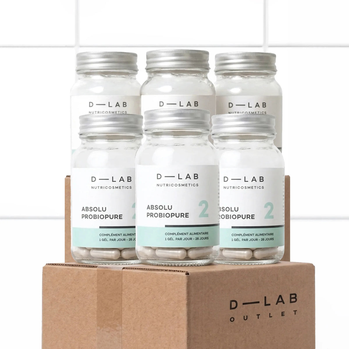 Six flacons Absolu Probiopure D-LAB, cure 6 mois de ferments lactiques Lactobacillus et Bifidobacterium, packshot sur carton D-LAB Outlet
